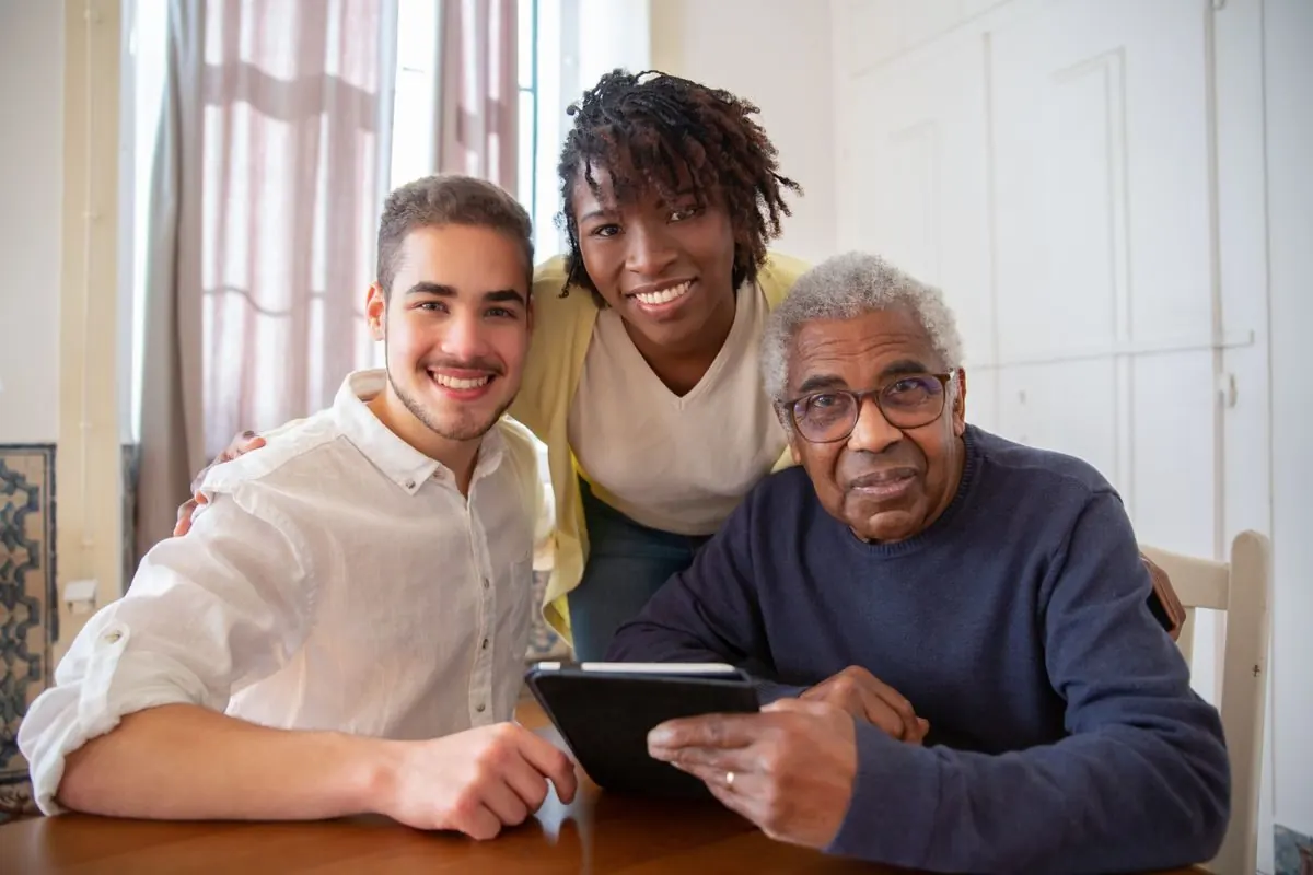 A family smiling together at home