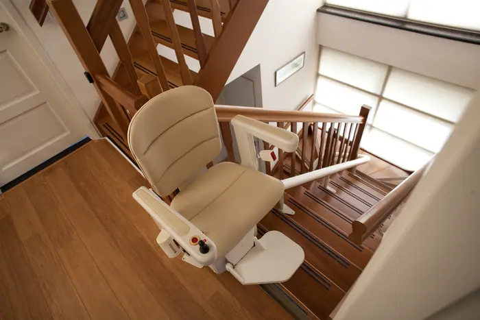 Curved stairlift: parks clear of the stairs