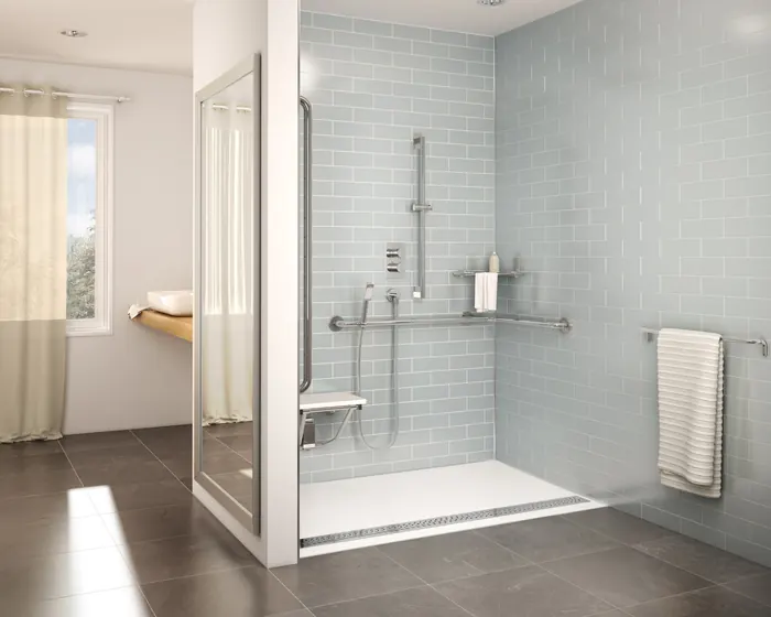 A shower with an open entry, grab bars and a folding seat