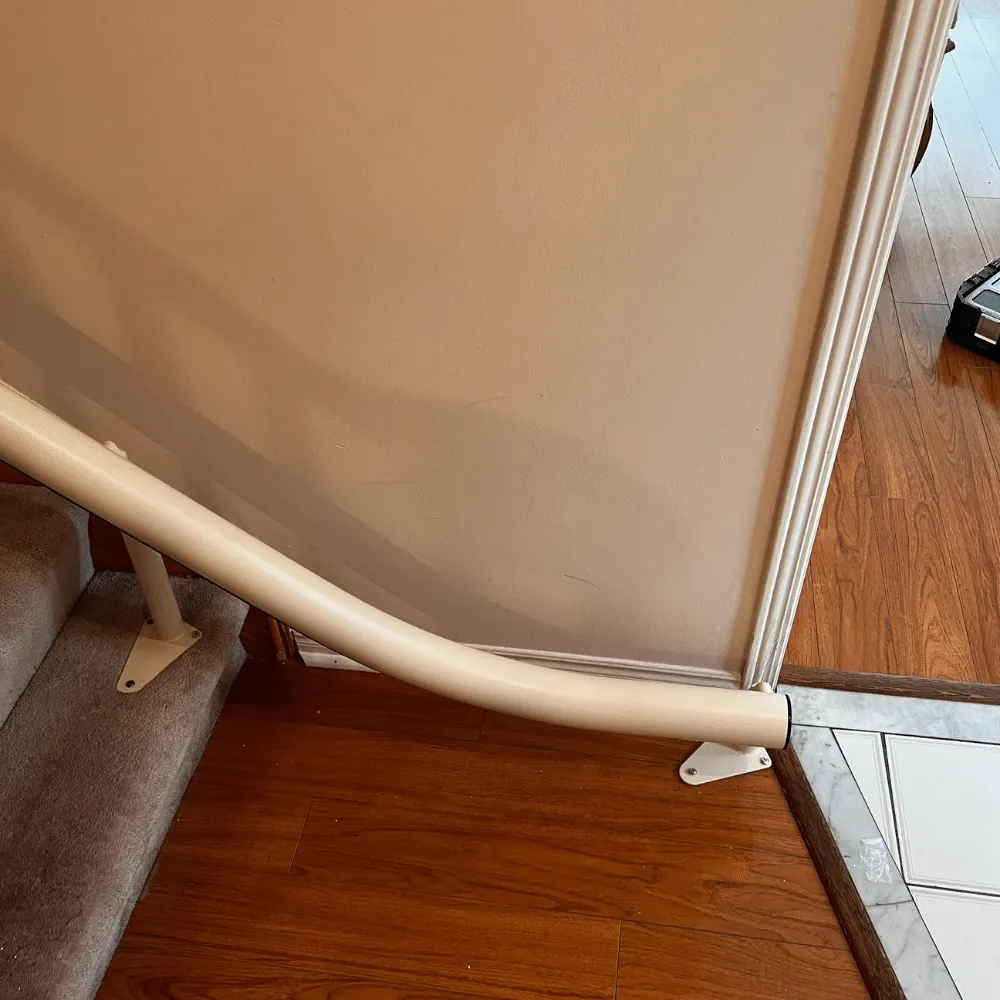 Handicare Freecurve Curved Stairlift Bottom overun freecurve stairlift, handicare freecurve
