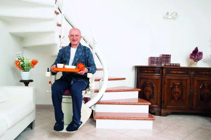 Curved stairlift: carry breakfast upstairs