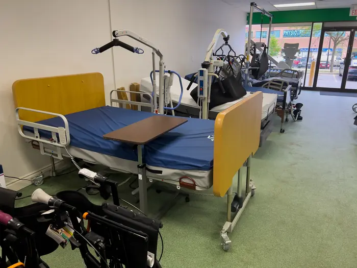 Hospital beds and patient lifts in the showroom