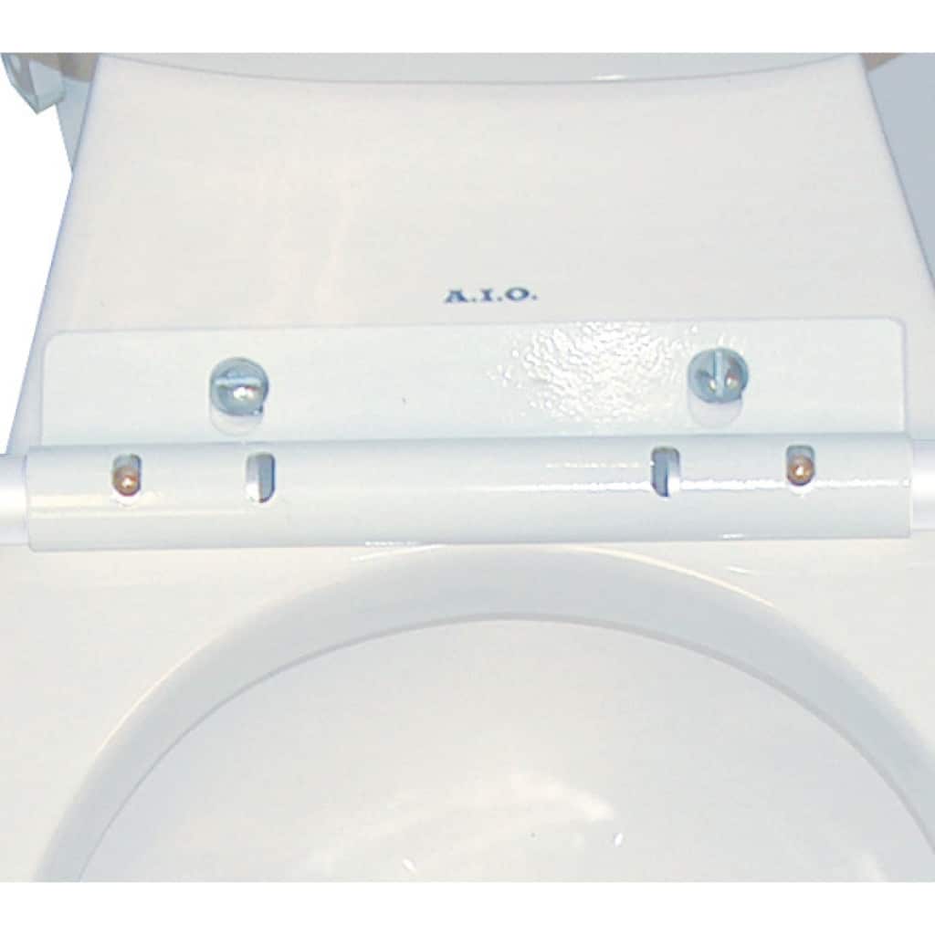 Top of the white bracket with two bolts under the toilet seat