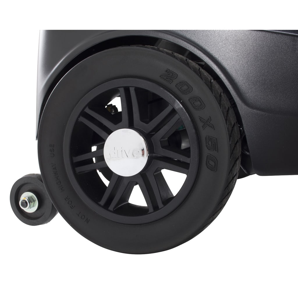 Close-up of the Scout rear wheel, a flat-free 8 inch tire with its anti-tip wheel alongside