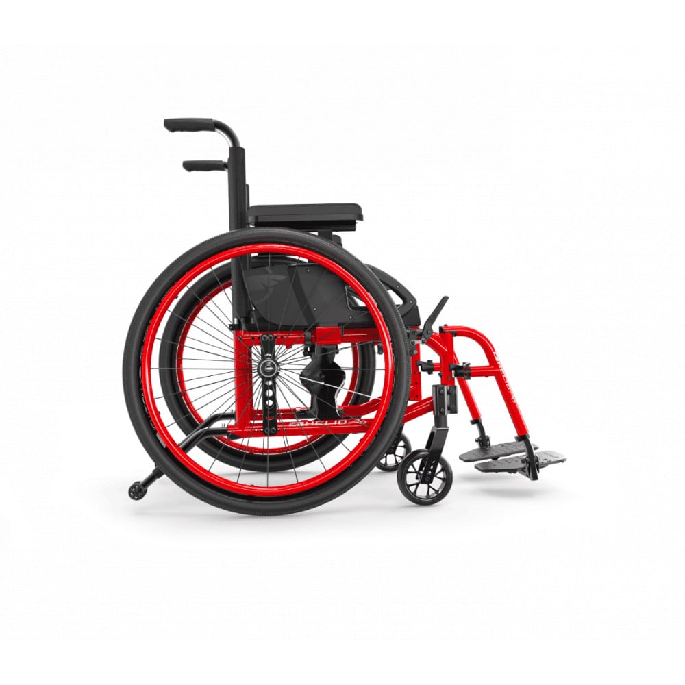Side view of a Ferrari Red Helio A6 showing the frame line, rear wheel and footrest