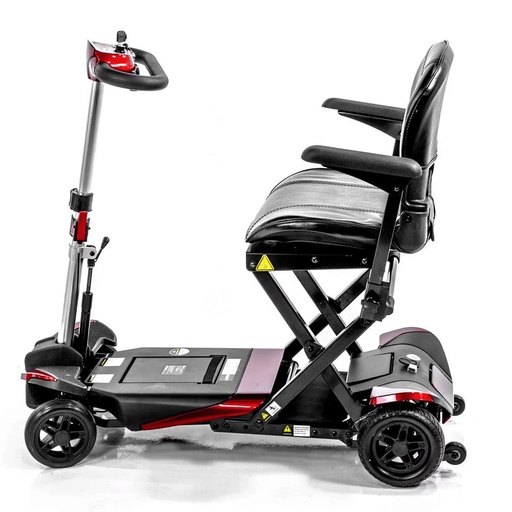 Red Transformer unfolded, side view with the telescoping tiller raised