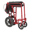 Red Expedition transport chair folded flat with the footrests off and the backrest lowered