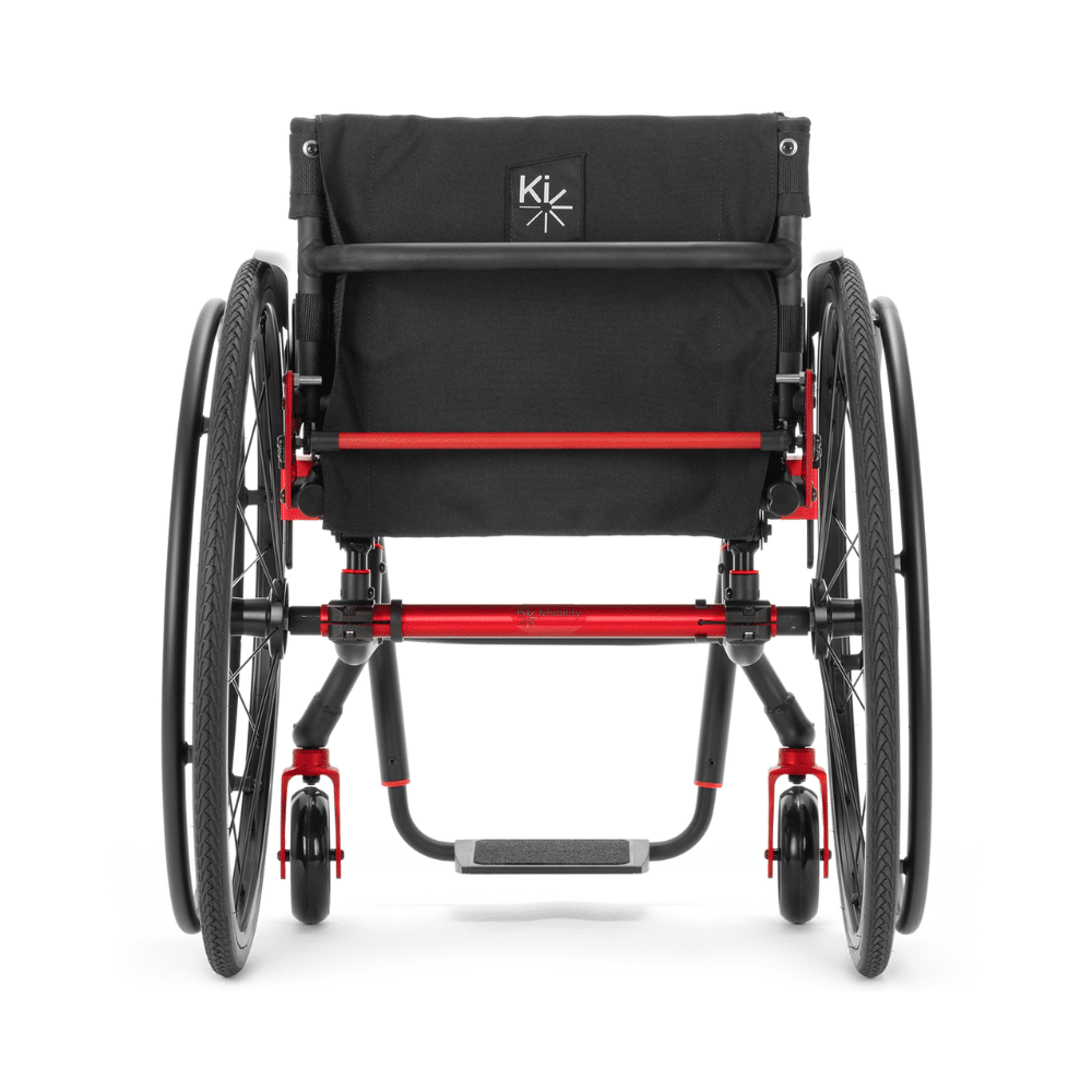 Rear view of the Ethos showing the back upholstery, red camber tube and quick-release rear wheels
