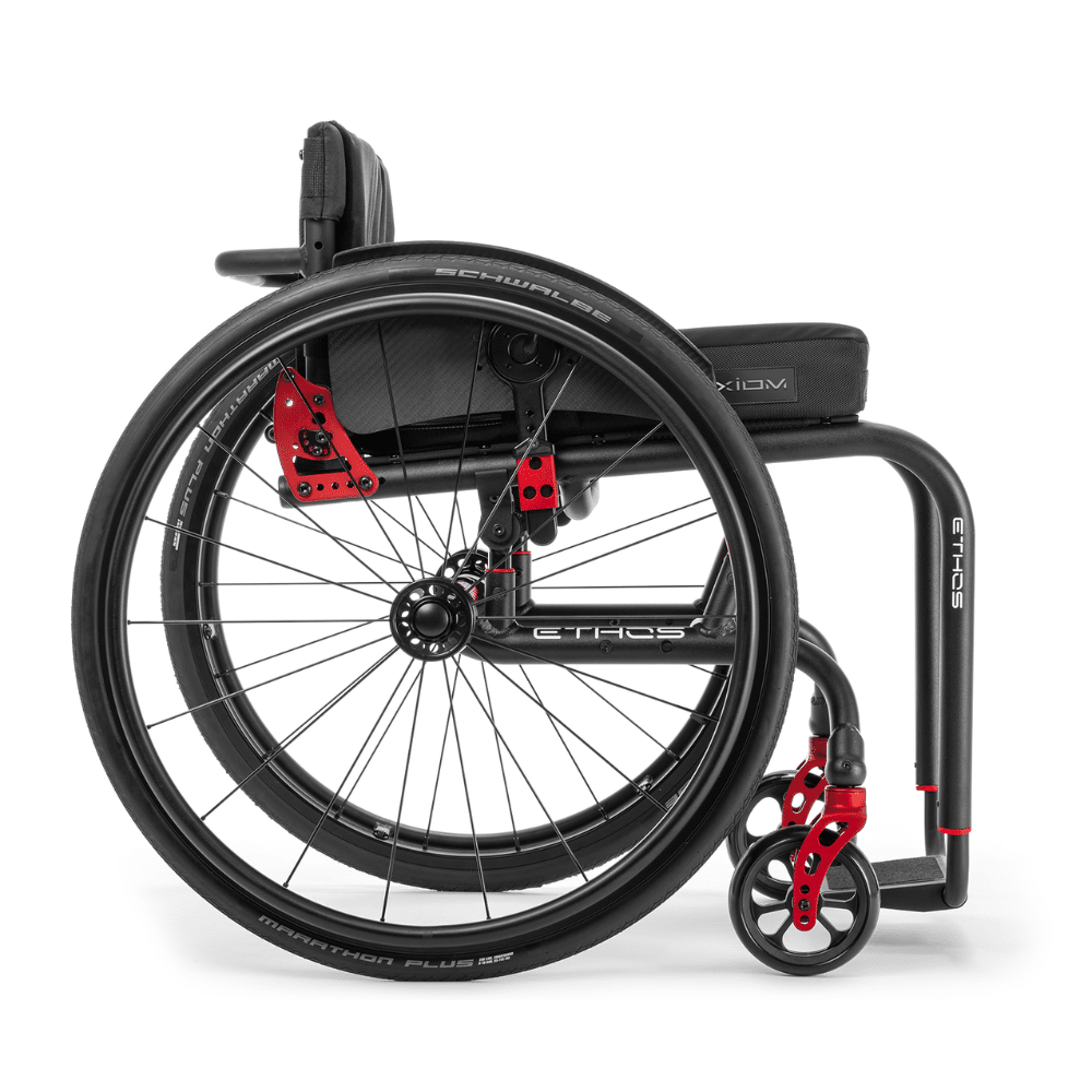 Side view of the Ethos: the seat frame rests on towers above a separate base frame carrying the casters