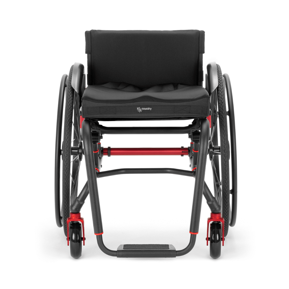 Front view of the Ethos: the footplate hangs from the seat frame, the casters sit outside it on the base frame
