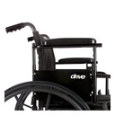 Armrest raised on its height adjustment above the black side panel, seen from the side