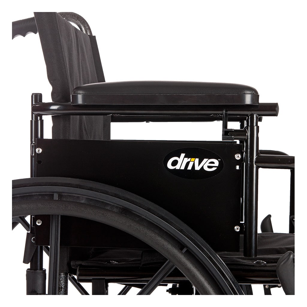 Padded armrest and side panel beside the rear wheel and hand rim, side view