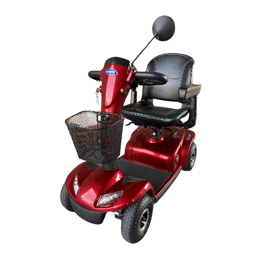 Leo in Ruby Red from the front right, shown with a wire basket and a rear-view mirror