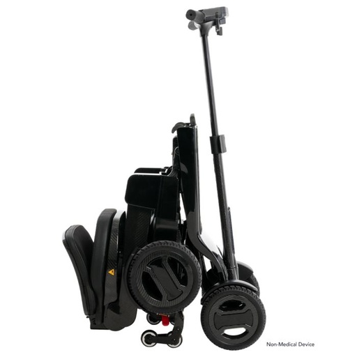 Go-Go Carbon folded and standing, with the telescoping tiller raised to roll it along