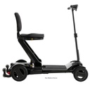 Right side of the Go-Go Carbon unfolded, showing the seat, the low deck and the tiller