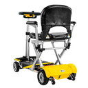 Rear three-quarter view of the yellow scooter, showing the seat back and rear shroud