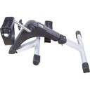 Exercise peddler partly folded, with one leg folded under the body and the other still open