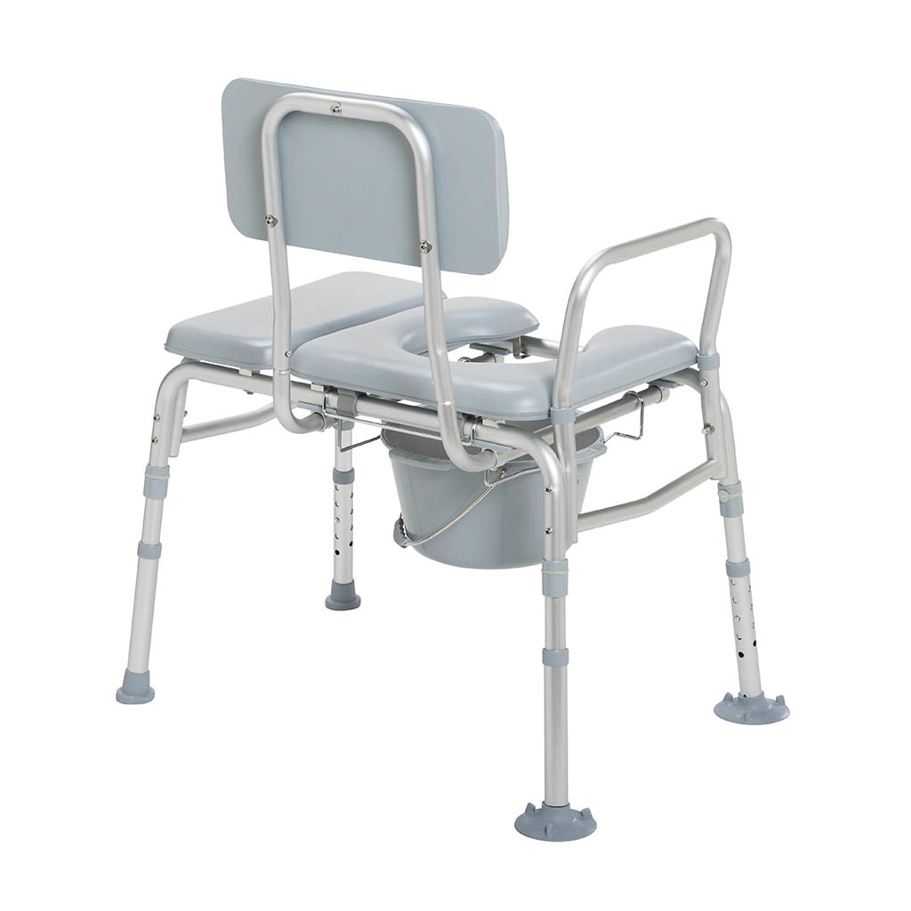 Padded commode transfer bench with the seat opening and the pail underneath