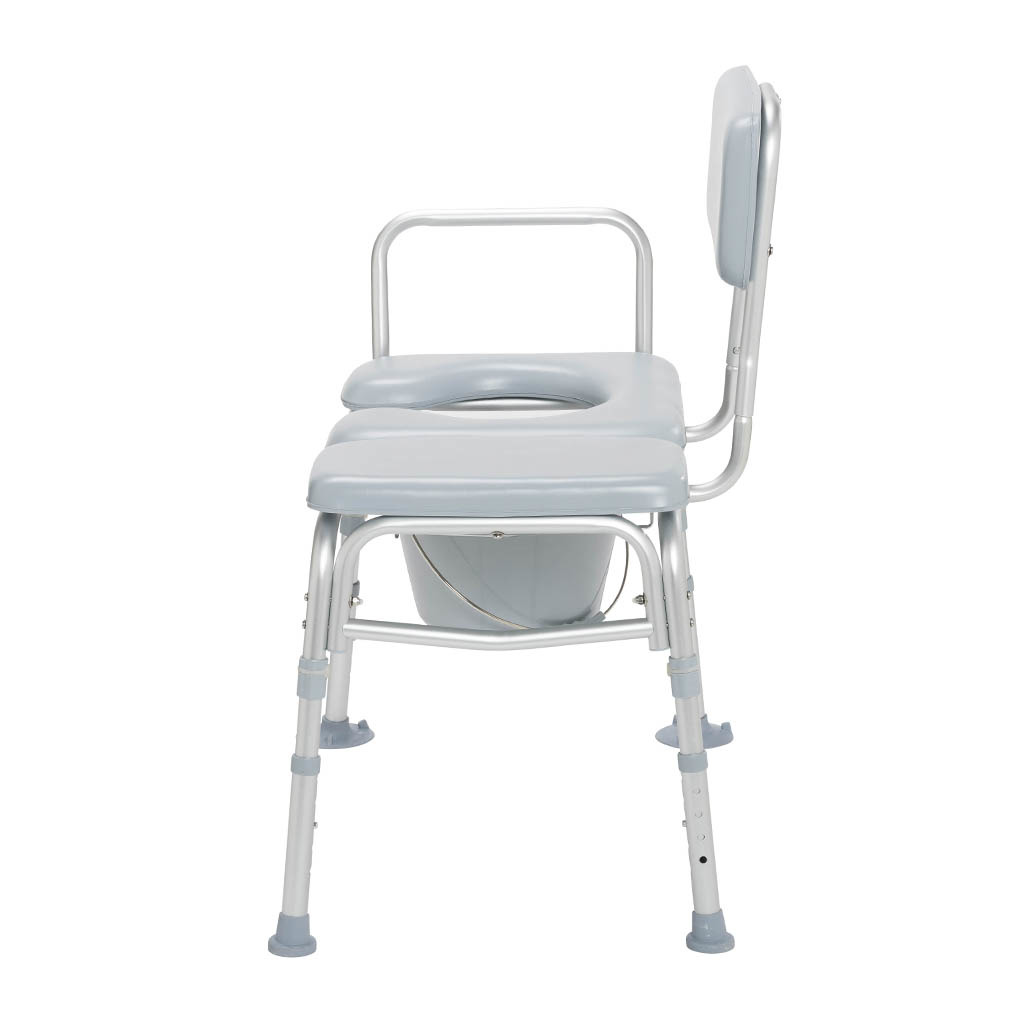 Padded commode transfer bench with the seat opening and the pail underneath