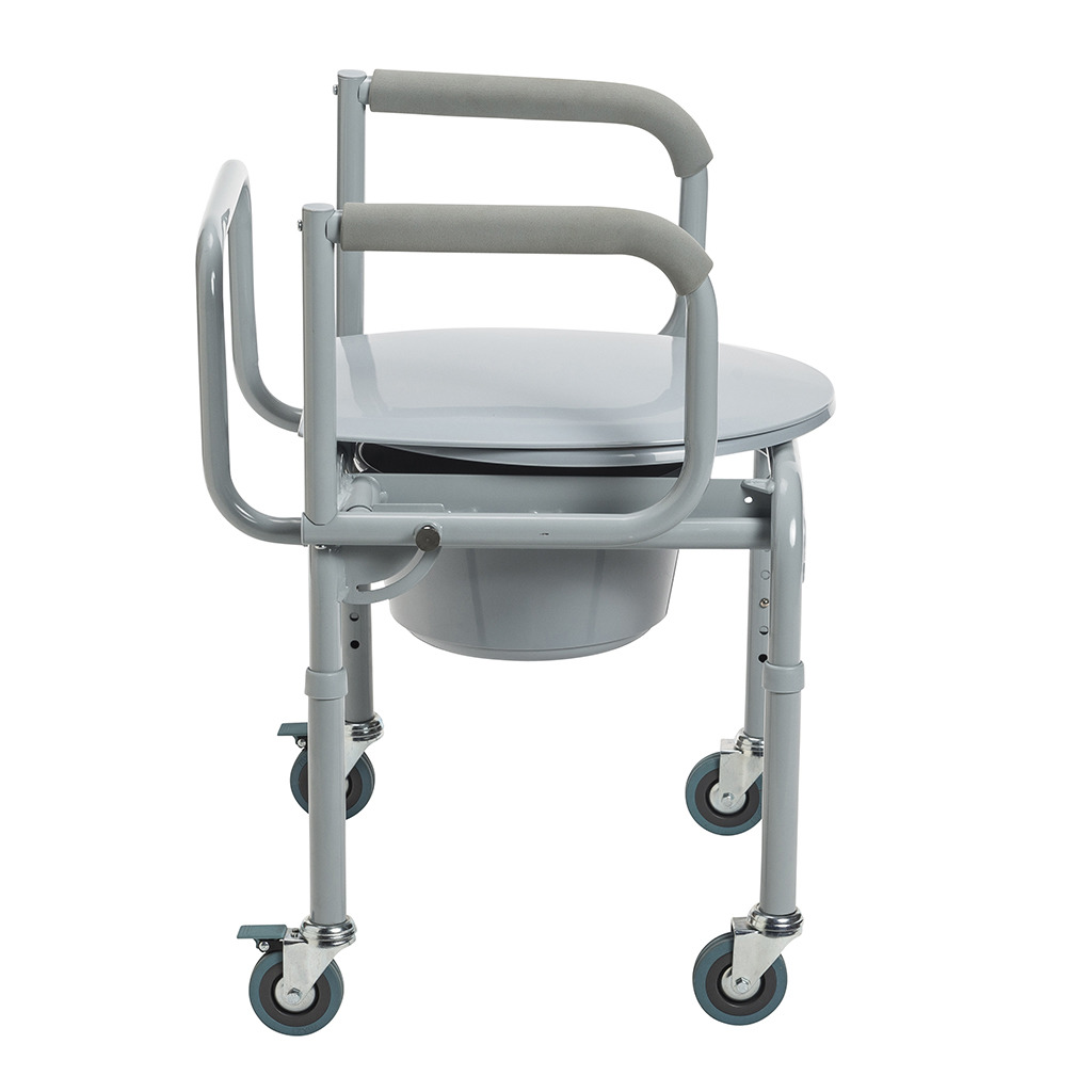 Side view showing the padded armrests, closed lid and locking casters