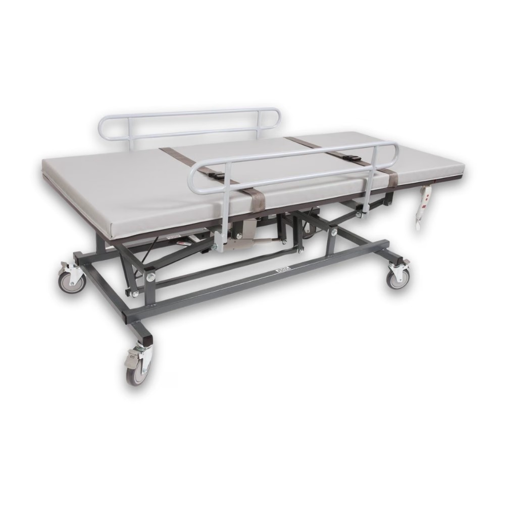 Can-Dan mobile change table with its side rails raised and two positioning belts across the mattress