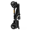 Black scooter folded flat and standing on its kickstands, seat and tiller collapsed