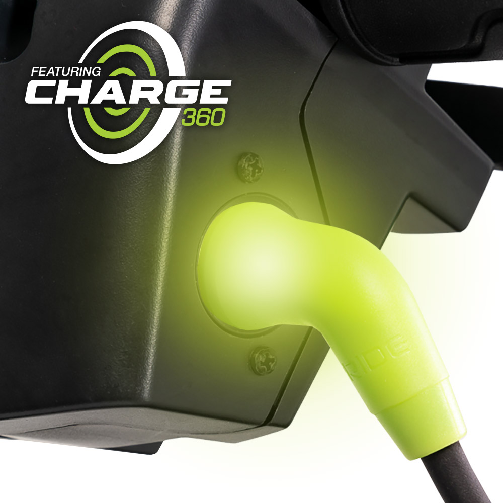 Close-up of the magnetic charger in the port, with a Charge360 logo printed on the photo