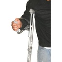 Platform attachment in use on a forearm crutch, forearm resting on the padded cradle