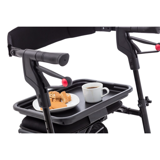 Nexus Tray on a neXus rollator with a coffee mug and a plate of biscuits