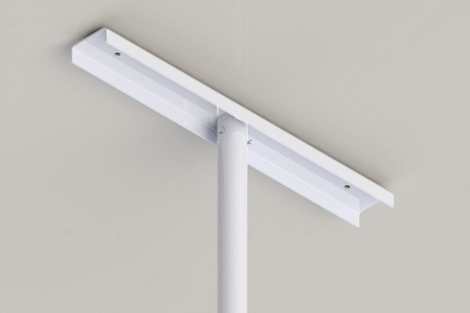 Top plate against the ceiling, showing the two holes for screws into a ceiling joist