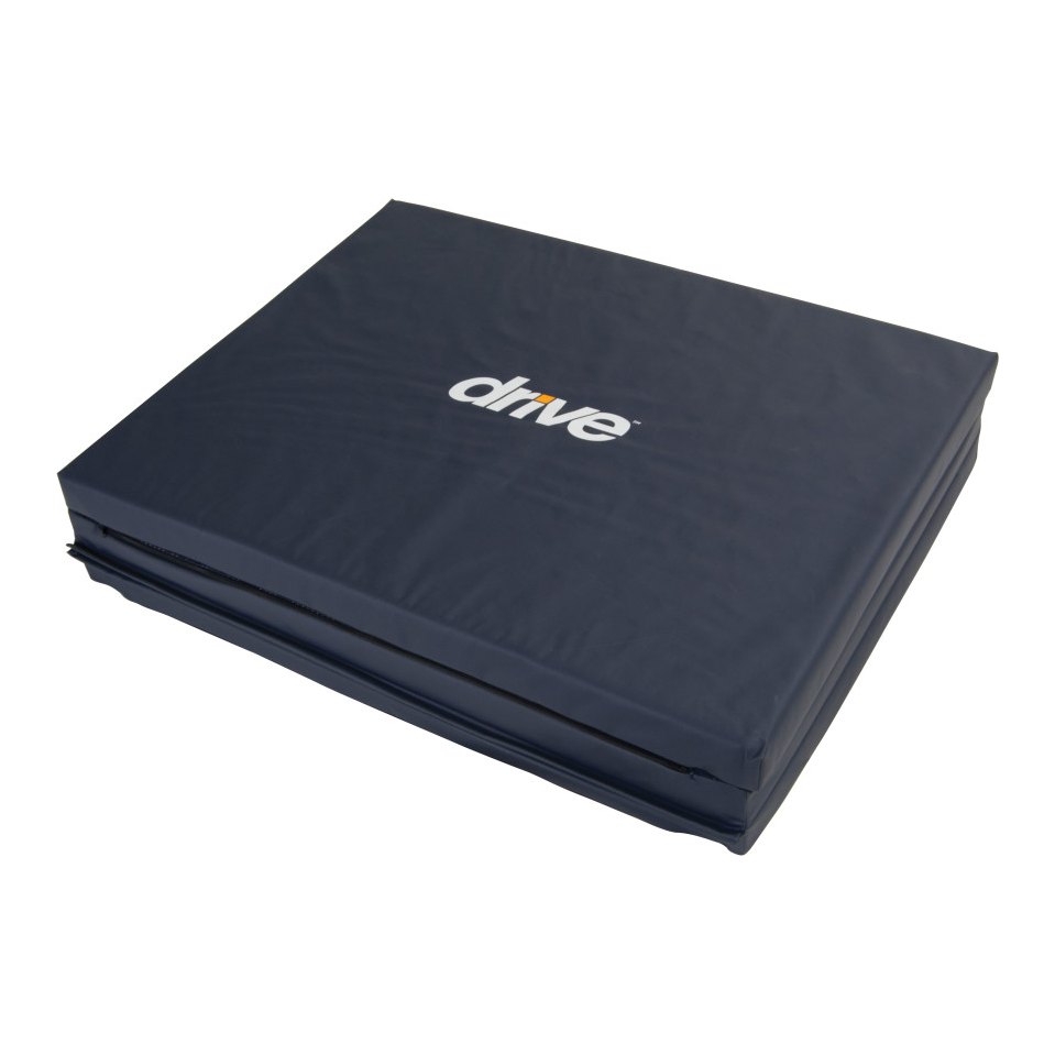 Fall mat folded into a single block of three stacked foam sections for storage