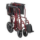 Folded transport chair from the front, showing the closed cross frame, casters and a footplate