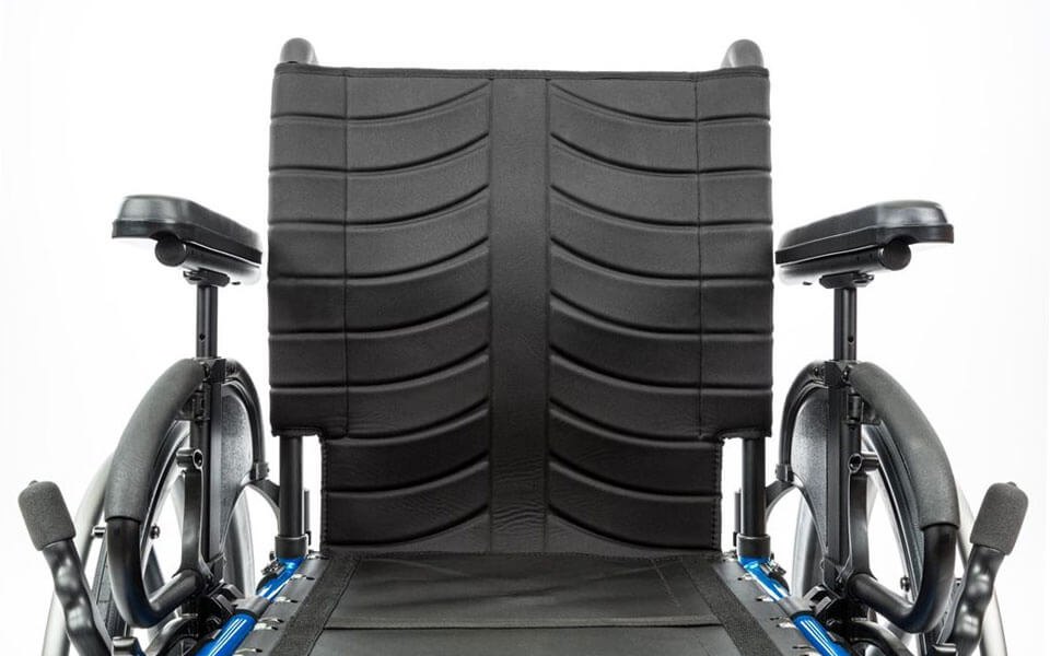 EXO back upholstery with contoured panels, flip-back armrests and wheel lock levers on a blue frame