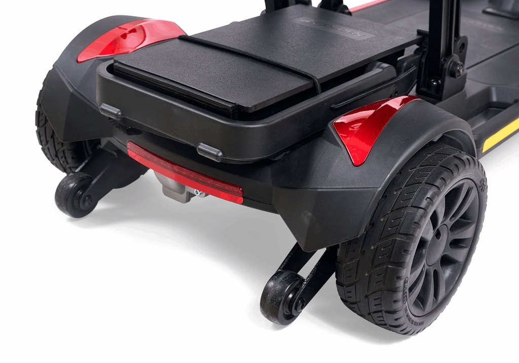 Spare lithium-ion battery pack held by an elastic cord in the rear holder