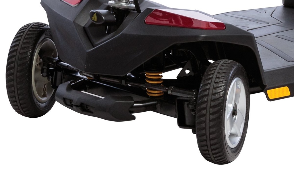 Rear of the Go Go LX showing the yellow CTS suspension spring, solid drive tires and anti-tip bar