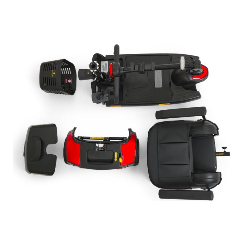 The scooter in its five travel pieces: basket, front frame with folded tiller, battery pack, rear section, seat