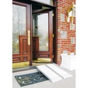 Single-fold ramp set up at a front door, showing the perforated deck and its top lip