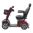 Drive Panther heavy duty scooter from the left side, red body and black captain seat
