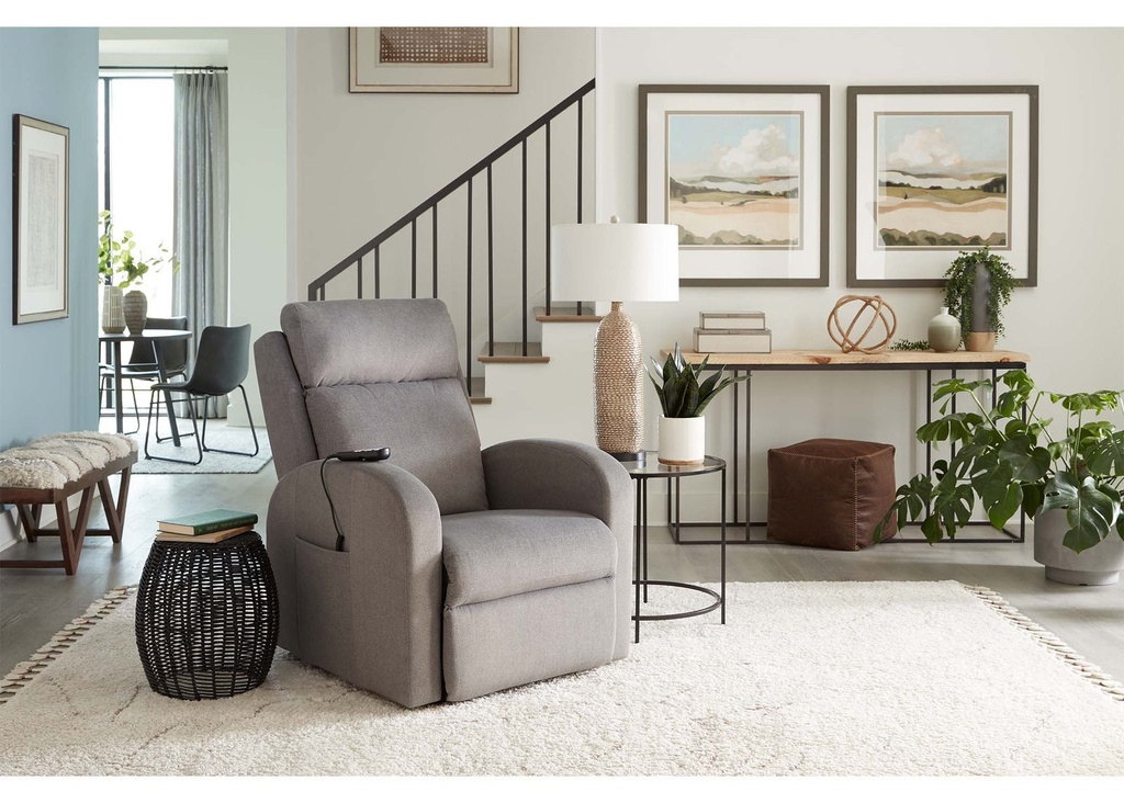 Grey Sleeper Slim PR750 upright in a living room, beside a side table