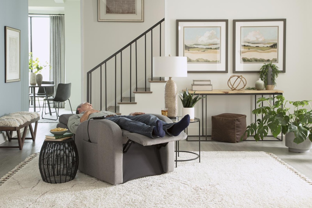 Grey Sleeper Slim PR750 reclined in a living room, footrest out