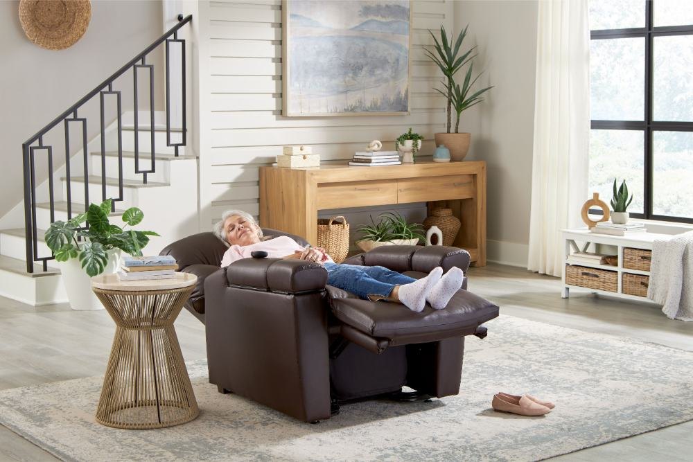 Cloud Plus PR511 reclined in a living room, footrest out, sitter lying back