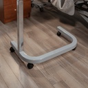 The SPAN overbed table's C-shaped base and chrome column on black casters, seen on a wood floor
