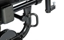 Close-up of a D-shaped transit tie-down loop bolted to the frame, with the tilt indicator dial below