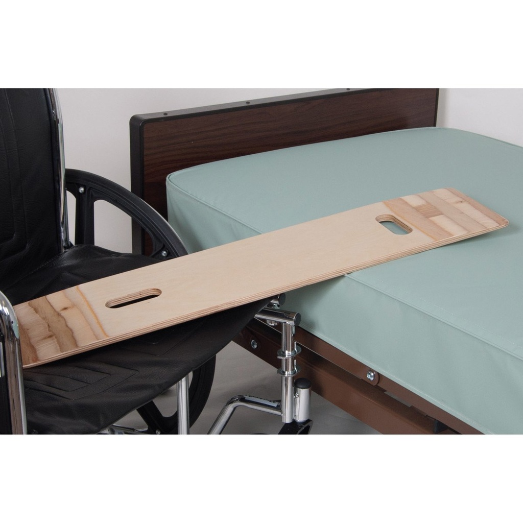 The transfer board laid from a wheelchair seat across to a bed