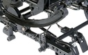 Under the seat: the curved rocker with its row of locking holes, the tilt dial and the foot release pedal