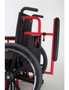 Close view of a flip-back armrest swung up beside the back post