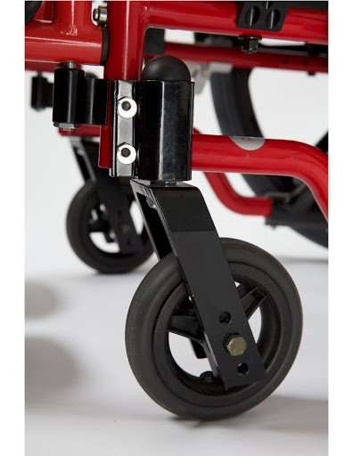 Front caster and fork below the caster housing of a red frame