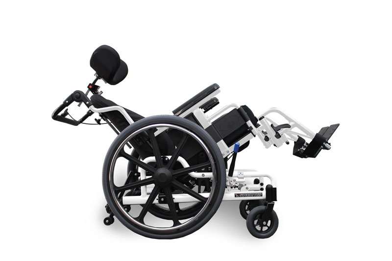 STP with a white custom-colour frame, seat and back tilted together, headrest fitted, seen from the side