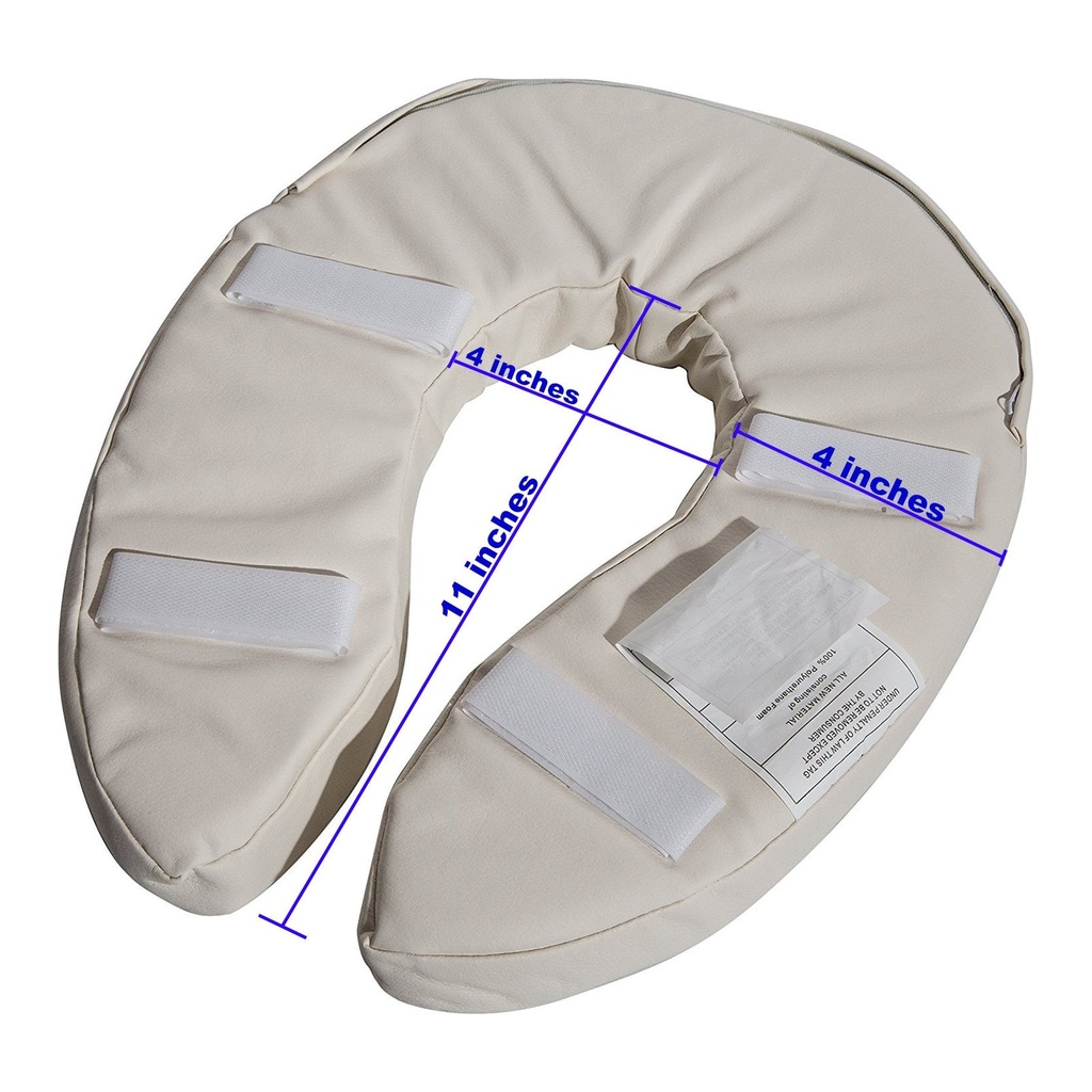 Underside of the cushion showing its three hook-and-loop straps and the stitched maker label
