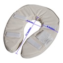 Underside of the cushion showing its three hook-and-loop straps and the stitched maker label